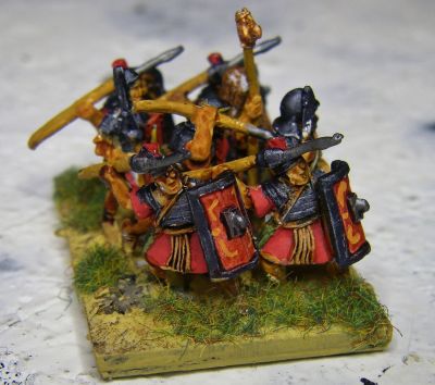 Legionaries
Some random figures I had kicking around, painted up with Contrasts. Most are Donnington, I think one may be Corvus Belli and the standard bearer is maybe Magister Militum/Chariot?
